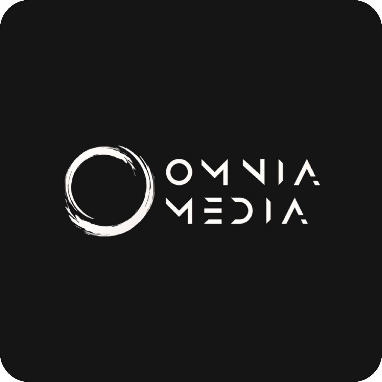 Logo of Omnia Media featuring a circle and stylized text on a black background, representing the streamlined efficiency of our operations.